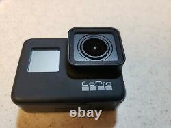 Gopro Hero 7 Black Action Camera W. 64gb Card, Wifi Remote, Mounts, And More