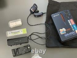 Sony 20th Anniversary WM-WE01 Walkman WIRELESS EARPHONES AND REMOTE CONTROL RARE
