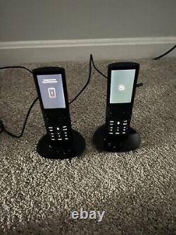Two Savant Rem-2000 Multi-Room Pro Remotes With Docks And Power Supplies Working
