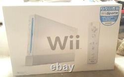 Console De Jeu Blanc Nintendo Wii Avec Ensemble De Jeux De Sport Wii Dans La Boîte Testée